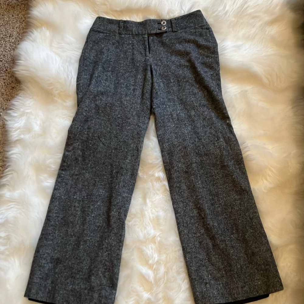 White House, black market, gray wool pants.